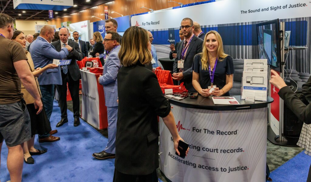 People in a tradeshow booth