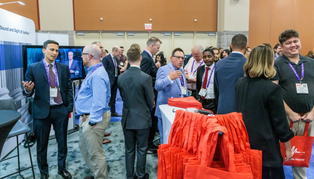 People in a tradeshow booth