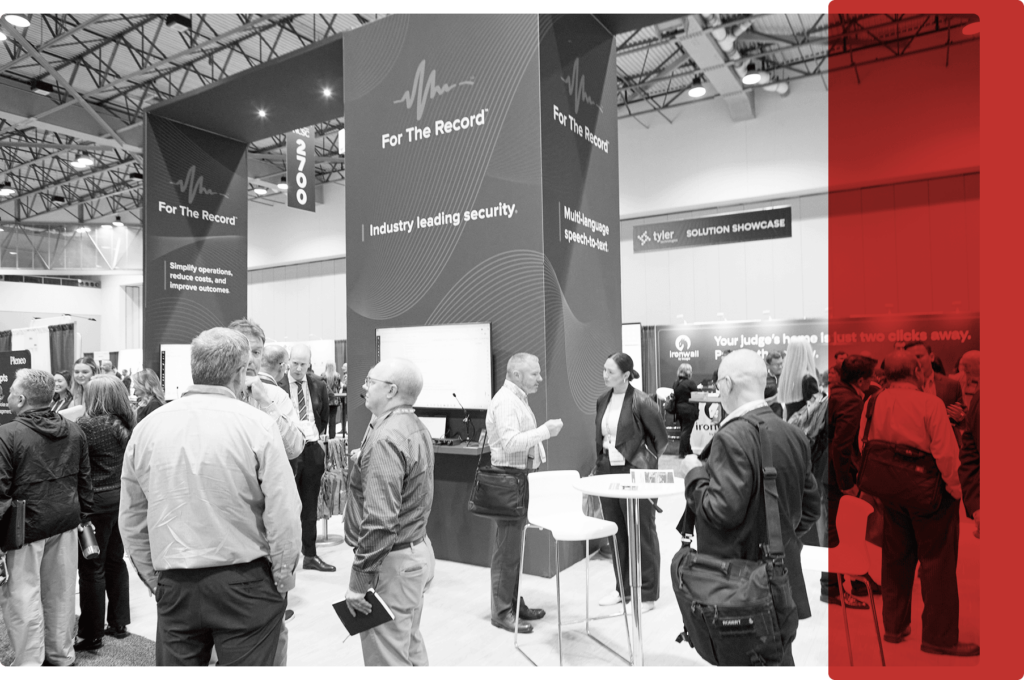 People at a conference booth