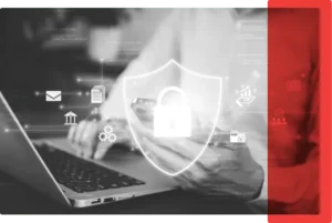 Security Image BW_Light Red Overlay (1) A photo of a man at the laptop with security icons