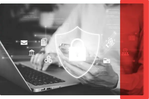 A photo of a man at the laptop with security icons